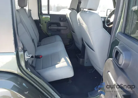 2009 Jeep Wrangler Unlimited Sahara z USA, uszkodzony, nr VIN 1J4GA59189L710032